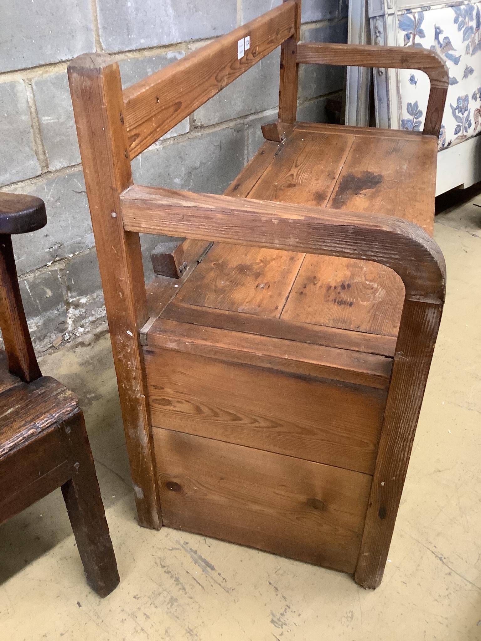 A Victorian stripped pine box settle